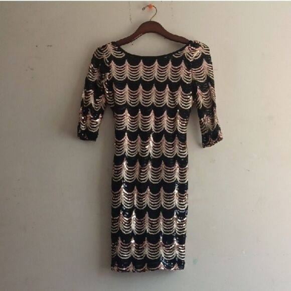 Dresses & Skirts - Elegant Black and Gold Sequin Dress